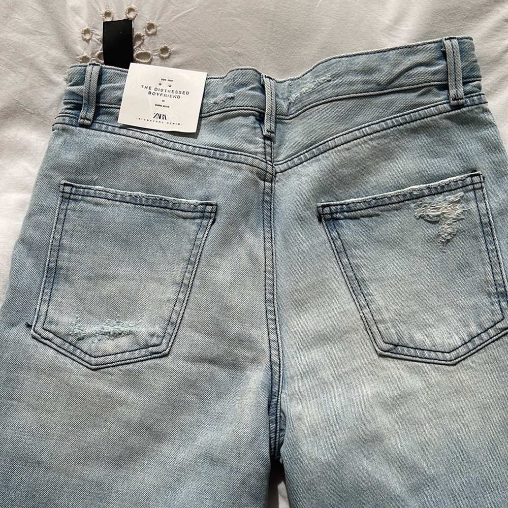 Zara size 4 the distressed boyfriend jeans in dark blue new with tags